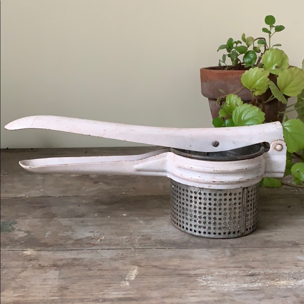 Vintage antique potato ricer, juicer, press.